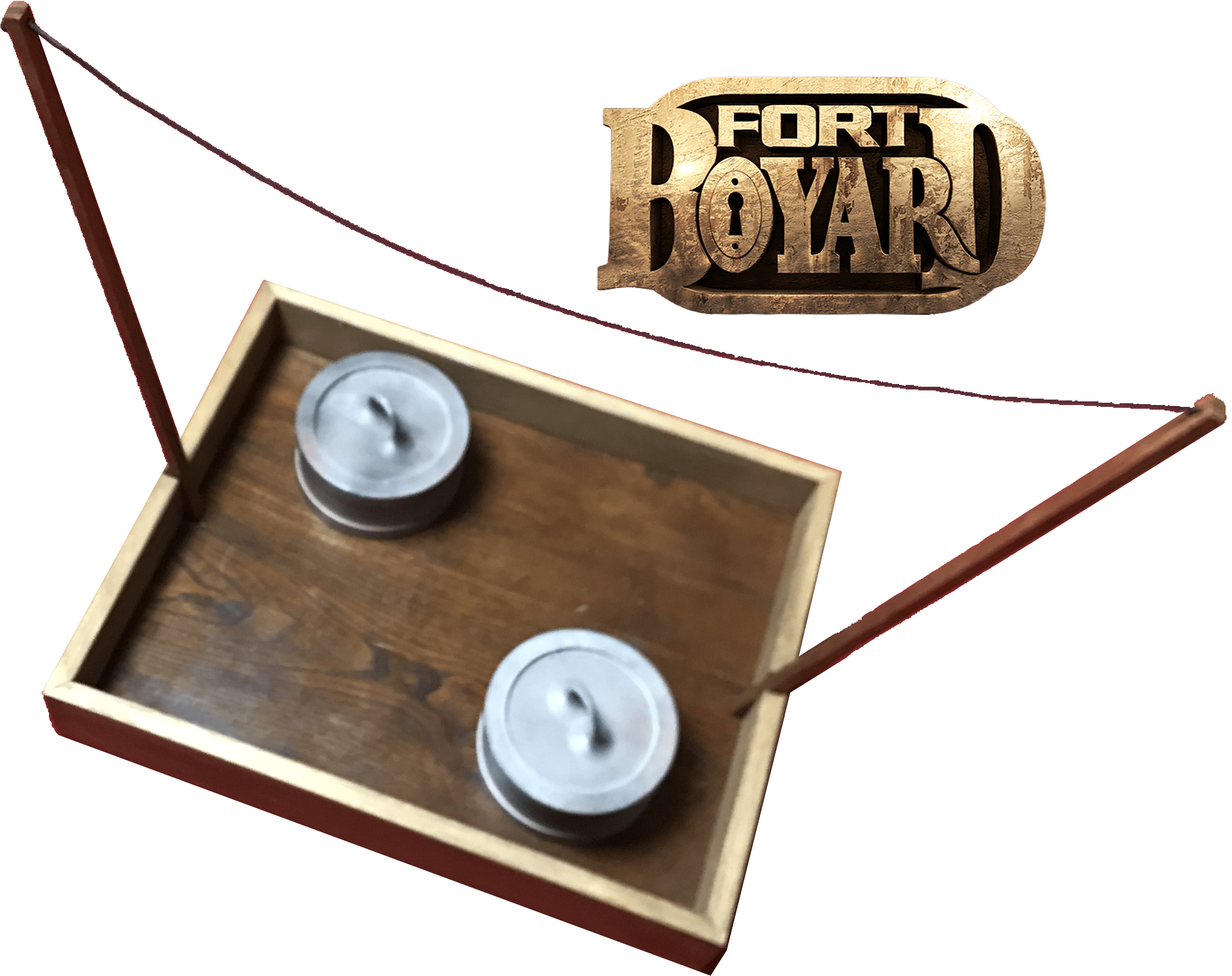 Jeu Les Poids, un duel de force du conseil de Fort Boyard, comprenant des poids et un fil tendu au-dessus de la table.